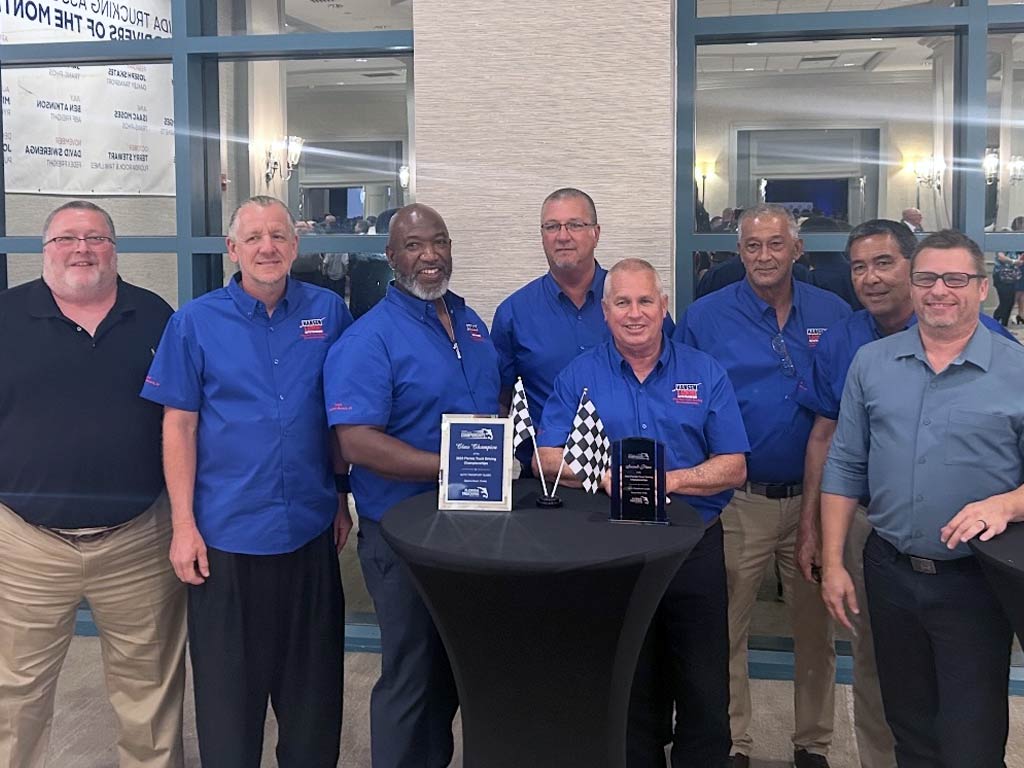Group photo at FTA Truck Driving Championship 2025 with David T., Jeff W., Marcus B., Steve M., Mack Y., Kevin M., Ricky M., and Chris B.
