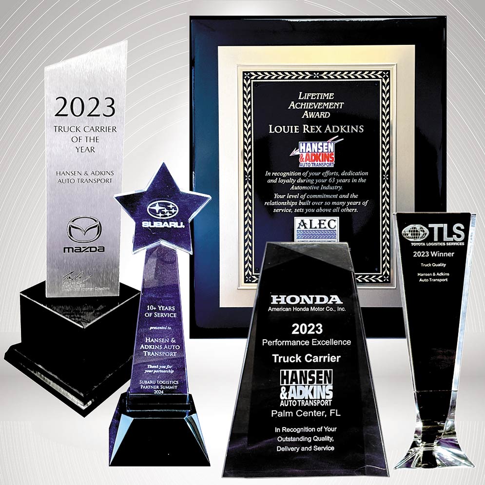 Hansen & Adkins Auto Transport truck receiving national truck carrier award recognition