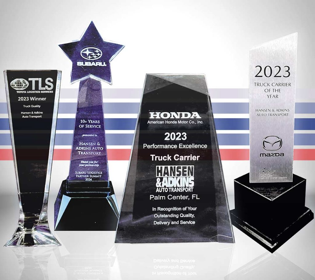 Hansen & Adkins Auto Transport truck receiving national truck carrier awards recognition
