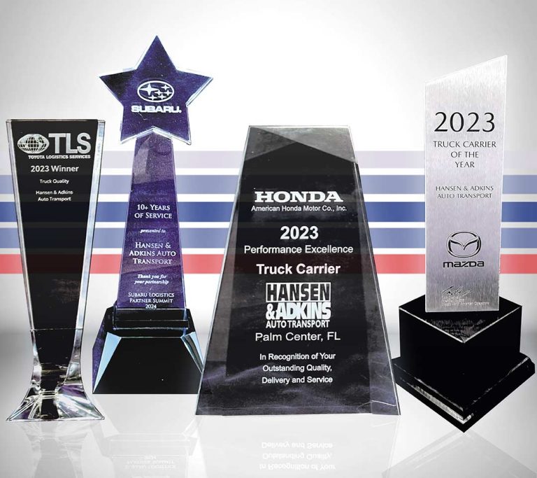 Hansen & Adkins Auto Transport truck receiving national truck carrier awards recognition